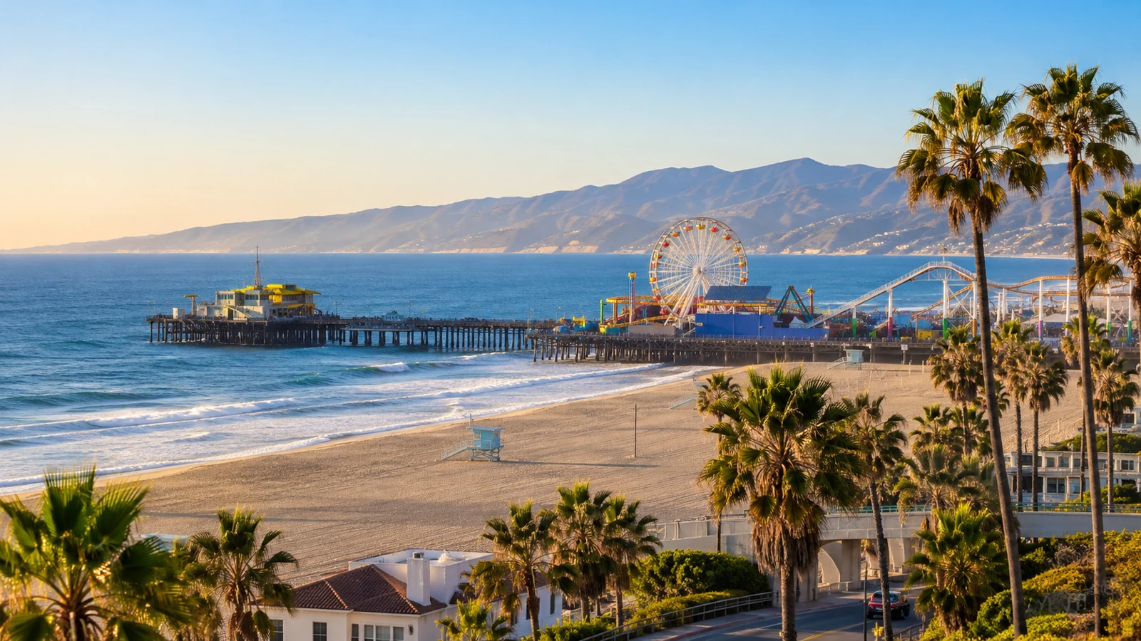 Illustrative Southern California coastline with a pier and Ferris wheel